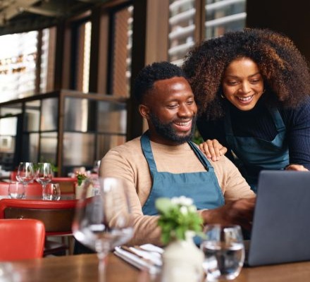 businessowners with laptop